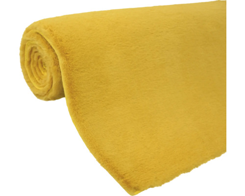 Tissu jaune enroulé