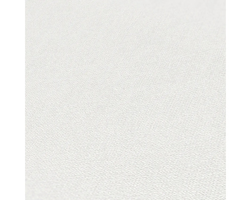 Nahaufnahme einer weißen Tapete mit leichter Struktur