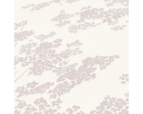 Nahaufnahme einer Tapete mit blütenförmigem Muster