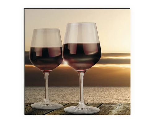 Wandbild mit zwei Weingläsern vor Sonnenuntergang