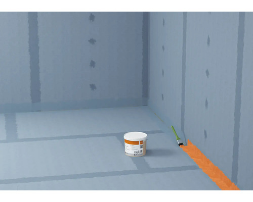 Étanchéification d''une pièce avec du mastic et un pinceau.