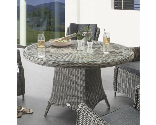 Table de jardin avec plateau en verre et surface en rotin