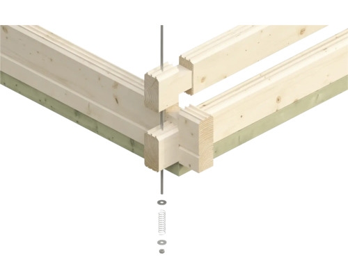 Joint d''angle d''une maison en bois avec des vis