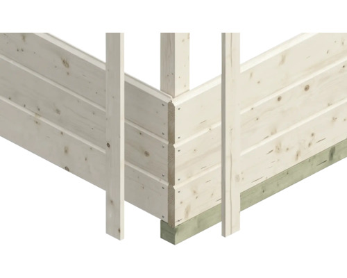 Détail d''angle d''une maison en bois avec assemblages à rainure et languette