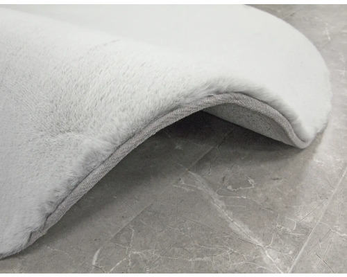 Vue détaillée d''un tapis de couleur claire avec une surface douce