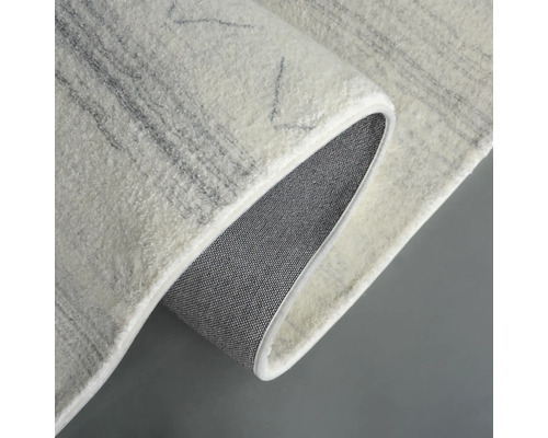 Tapis avec motif et envers tissé