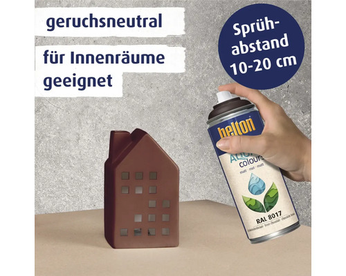 Helton Farbspraydose wird zum Sprühen eines Dekorationsobjekts in Hausform verwendet, geruchsneutral und für Innenräume geeignet, Sprühabstand 10 bis 20 Zentimeter