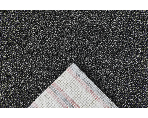 Vue détaillée d''un tapis gris avec envers textile