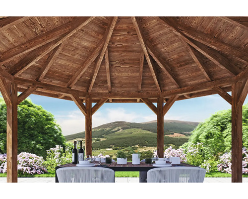 Pavillon de jardin en bois avec table dressée et vue sur la nature