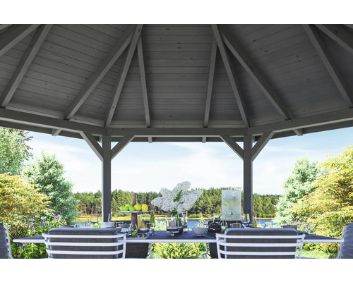Pavillon de jardin en bois avec table et chaises dans le jardin