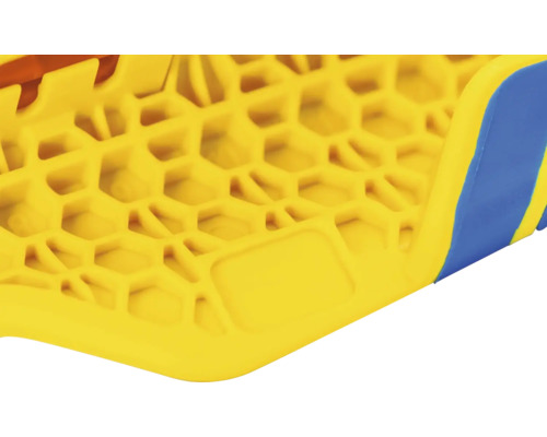 Vue détaillée d''un produit en plastique jaune avec une structure en nid d''abeille