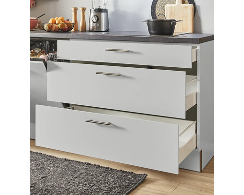 Meuble bas de cuisine avec trois tiroirs ouverts pour le rangement