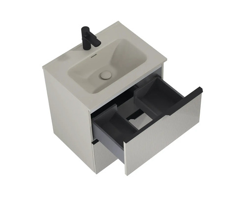 Waschtisch mit geöffneter Schublade und Armatur