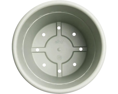 Vue intérieure d''un pot de fleurs rond avec des trous pour le drainage