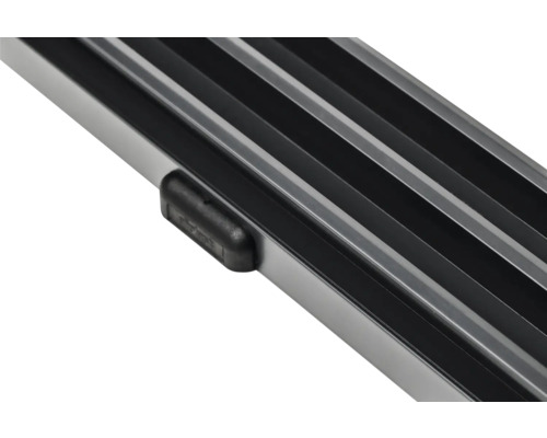 Detailansicht einer Aluminium-Fußmatte mit Gummistopfen