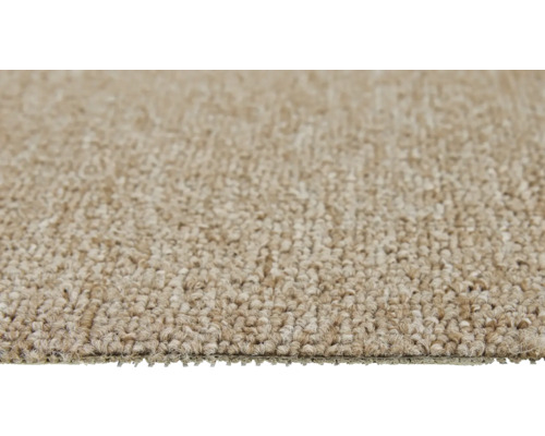 Gros plan d''un tapis beige.