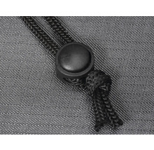 Kordelstopper mit Kordelzug auf Textil