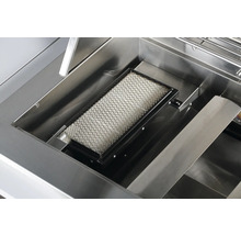 Vue détaillée d''un brûleur en céramique pour un barbecue