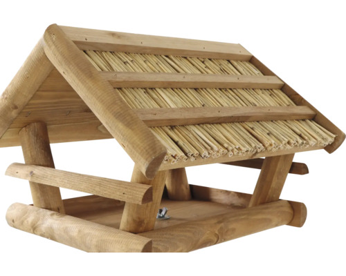 Mangeoire en bois avec toit de chaume