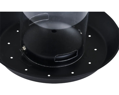 Gros plan d''une mangeoire à oiseaux avec une base ronde