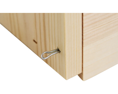 Vue détaillée d''un lit en bois avec une goupille de sécurité