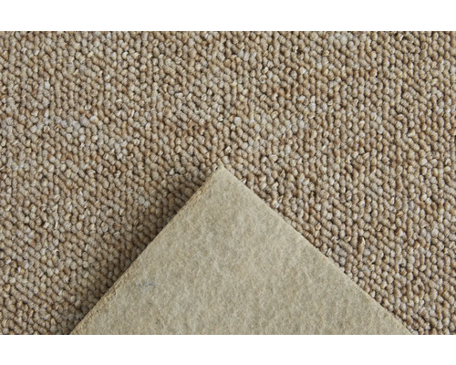 Gros plan d''un tapis beige avec envers de tapis