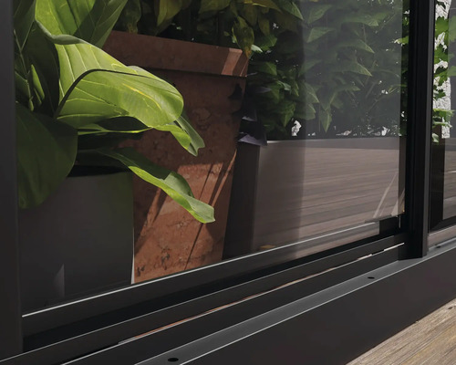 Gros plan d''une balustrade de terrasse noire avec des plantes