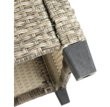 Detailansicht eines Möbelstücks mit Rattanstruktur und Fuß