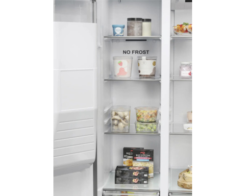 Intérieur d''un congélateur avec des aliments et l''inscription No Frost.