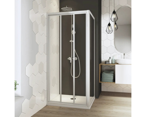 Porte coulissante Breuer Fara 4 90 cm verre transparent profilé couleur blanc Cabine de douche avec porte coulissante dans une salle de bains avec lavabo et carreaux hexagonaux.