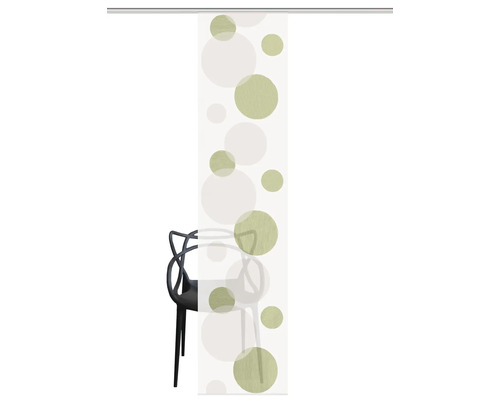 Panneau coulissant avec motif de cercles devant une chaise