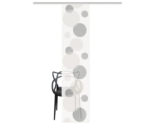 Panneau coulissant avec motif de cercle devant une chaise