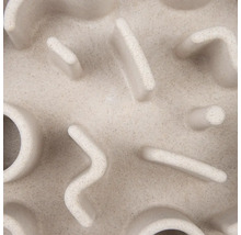 Nahaufnahme eines beige-farbenen Labyrinths mit verschiedenen Formen.