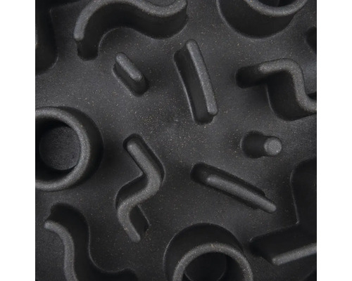 Gros plan d''une gamelle avec motif en relief