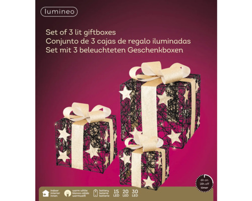 Ensemble de trois boîtes cadeaux lumineuses avec étoiles et nœuds, alimentées par piles