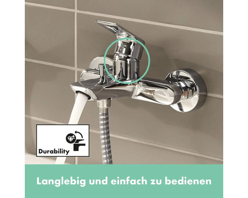 Wandarmatur mit Wasserauslauf und Symbol für Langlebigkeit
