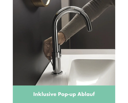 Einhandmischbatterie aus Chrom mit Pop-up Ablaufgarnitur montiert auf einem Waschbecken