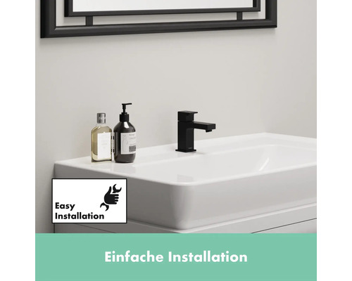Lavabo avec robinet noir et mention d''une installation facile