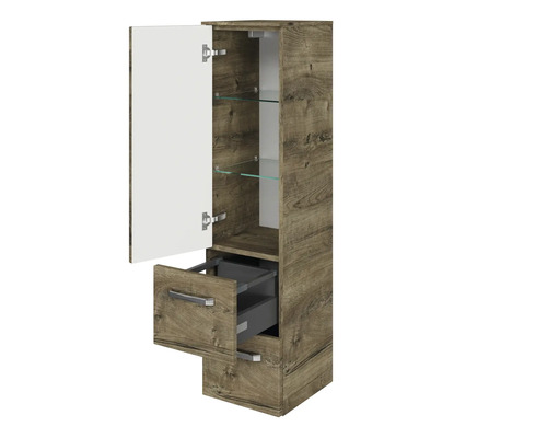 Armoire haute avec porte, tiroirs et étagères en verre dans la salle de bain