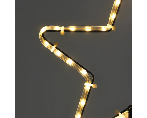 Gros plan d''une guirlande lumineuse en forme d''étoile pour la décoration