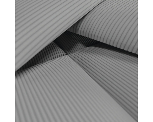 Gros plan d''un tissu d''ameublement avec motif côtelé