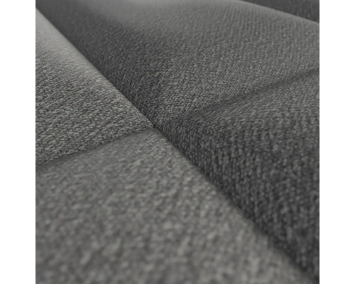 Gros plan d''un revêtement en tissu gris matelassé