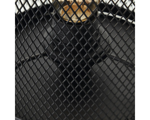 Gros plan d''une lampe avec un treillis métallique noir