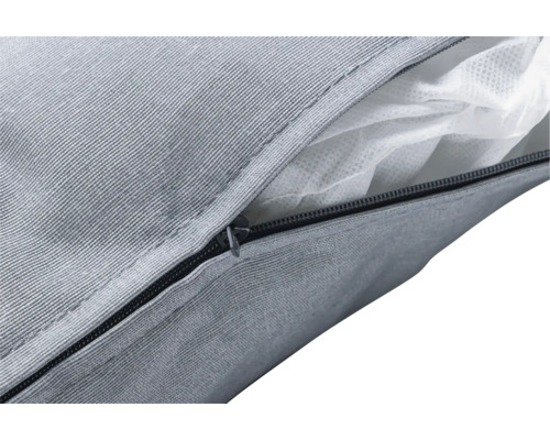 Gros plan d''une housse de coussin d''assise grise avec fermeture éclair