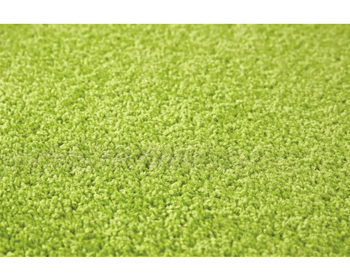 Gros plan d''un tapis vert à poils longs