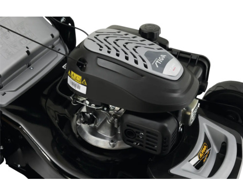 Gros plan du moteur d''une tondeuse à gazon