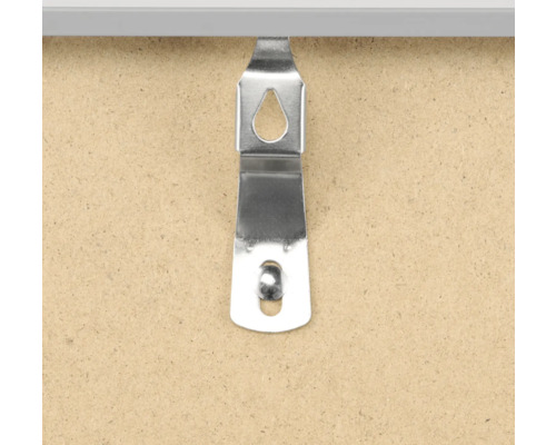 Crochet de suspension métallique sur un cadre photo pour fixation murale