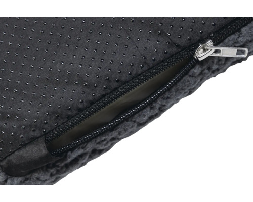 Vue détaillée d''un lit pour chien avec fermeture éclair et picots antidérapants