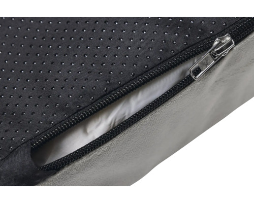 Gros plan d''un lit pour chien avec fermeture éclair