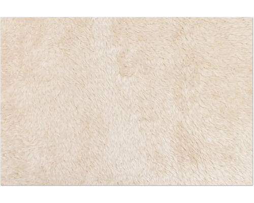 Nahaufnahme eines hellen, flauschigen Teppichs